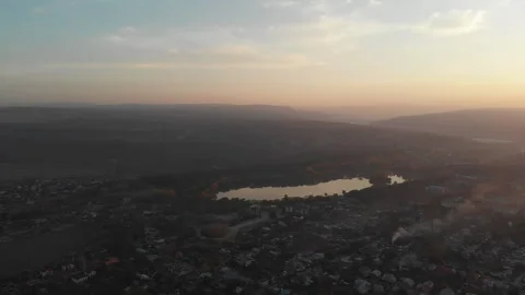 Top view of small lake located among private houses in the countryside Stock Footage 144130545