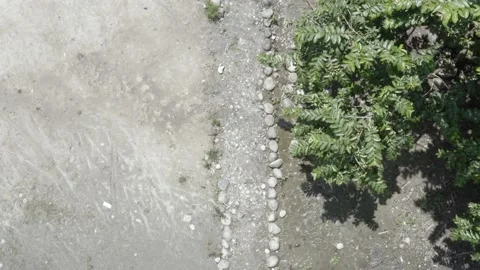 Top view of a small path indicated by the stones at the side Stock Footage 146753663