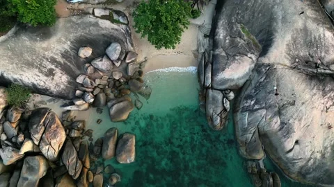 Top view small tropical beach, with small waves and turquoise sea water Stock Footage 240055778