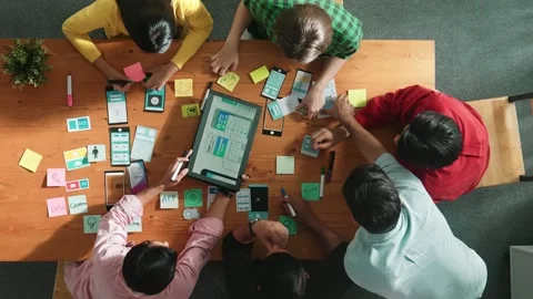 Top view of smart developer working together to develop Ui design. Convocation. Stock Footage 267173512