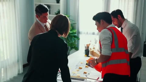 Top view of smart engineer team talking about house construction. Alimentation. Stock Footage 271665087