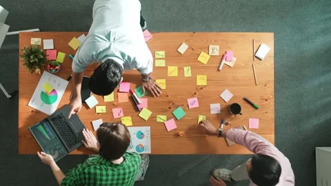 Top view of smart manager using laptop while team support her work. Convocation. Stock Footage 273966013