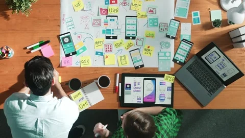 Top view of smart manager working together to develop Ux Ui design. Convocation. Stock Footage 271474562