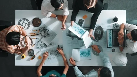 Top view of smart team working together to design turbine engine. Alimentation. Stock Footage 269991269