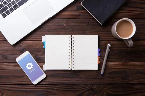 Top view of smartphone installing update process with gearbox percentage progres Stock Photos