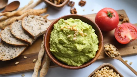 Top View Of Smashed Avocado For Multigrain Toast Bread, Tasty Healthy Breakfast. Stock Footage 112606235