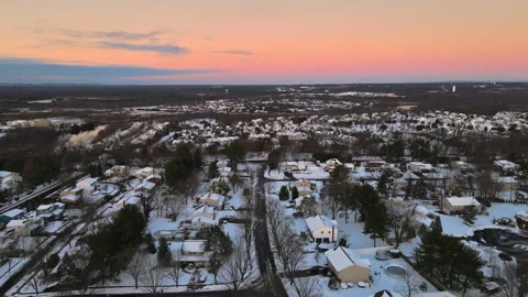 Top view the snow covered roofs houses and town streets of USA Stock Footage 162417622