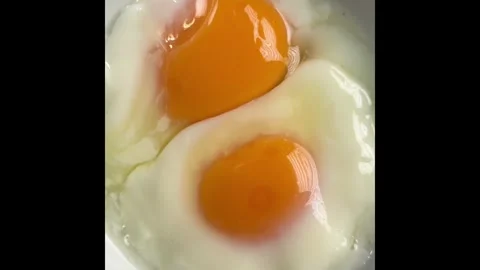 Top view of Soft-boiled eggs in ceramic dish,morning meal, Video stock 303616312