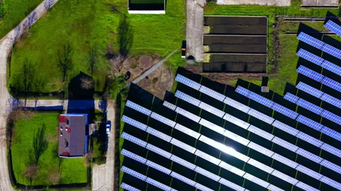 Top view of solar panel array near industrial building Stock-Footage 329622366