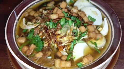 Top view of Soto Klethuk culinary typical of Blora, Central Java, Indonesia Stock Footage 321860244