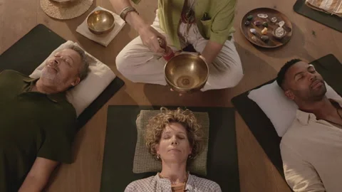 Top view of sound healing session at wellbeing center Stock Footage 340878611