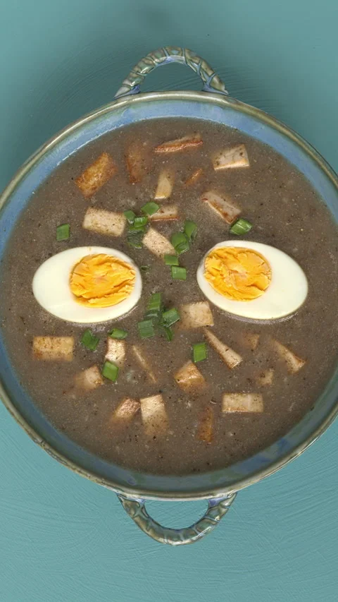 Top view of sour rye soup - vegetarian version. Stock Footage 332244692
