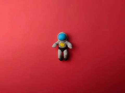 Top view spaceman on a red background Stock Photos