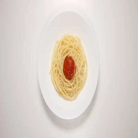 TOP VIEW: Spaghetti with sauce on a white dish - put, eat (stop motion) Stock Footage 69359085