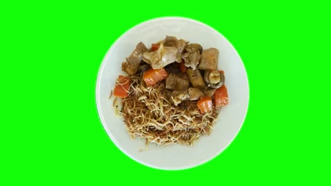 Top view, Spaghetti with vegetables and mushrooms on a plate. The plate rotat Stock Footage 145518973
