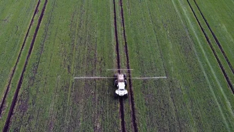 Top view of a special tractor in the field. Farmer on an agricultural machine Stock Footage 257890895