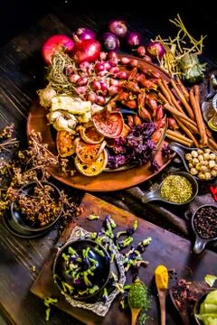 Top view spices and herbs ingredient decoration on wood table for cook.. Stock Photos