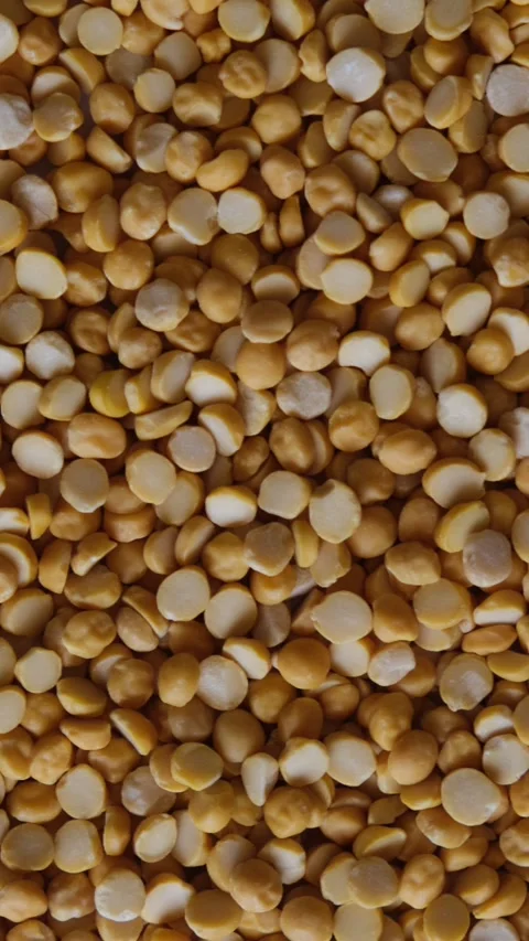 Top view of split chickpea lentils or Chana Dal 動画素材 330738591