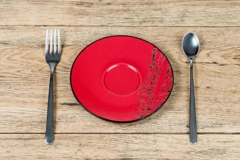 Top view spoon fork and plate Stock Photos