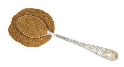 Top view of spoon with ground chicory in pile Stock Photos