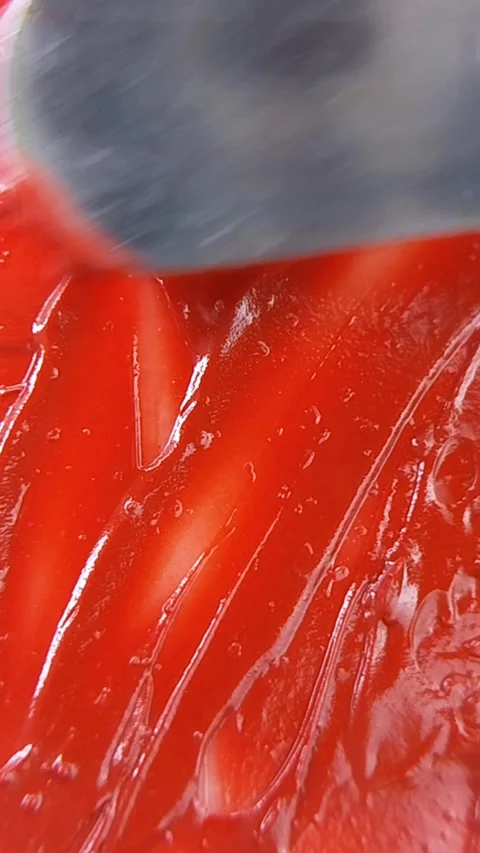 Top view of spreading red sauce-like liquid using a metal tool. Smooth laye.. Vídeo Stock 346933054