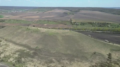 Top view of spring fields divided into sectors. Rural agriculture scene Stock Footage 242842123