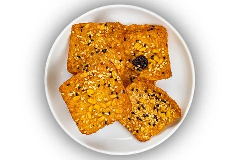 Top view of square shape bars of crispy homemade multigrain  rice cracker. Stock Photos