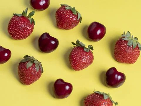 Top view of the square-shaped cherries and strawberries. Healthy food, vegeta Stock Photos