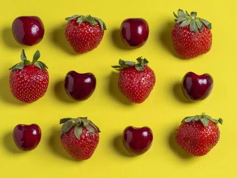 Top view of the square-shaped cherries and strawberries. Healthy food, vegeta Stock Photos