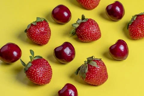 Top view of the square-shaped cherries and strawberries. Healthy food, vegeta Stock Photos