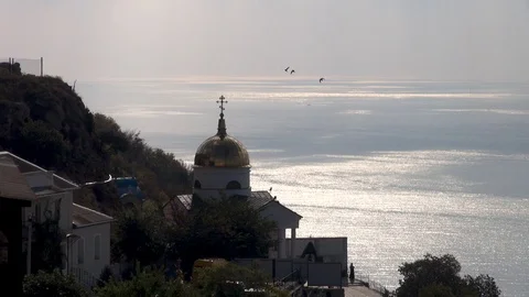 Top view of St. George Monastery at Cape Fiolent. The golden dome of church. Stock Footage 105842723