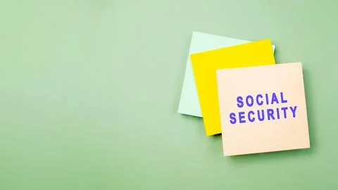 Top view of a stack of three square sticky notes in yellow, light green, an.. Stock Photos