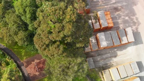 Top view on stacks of air drying timber planks next to sinkhole in Mount Stock Footage 146349570