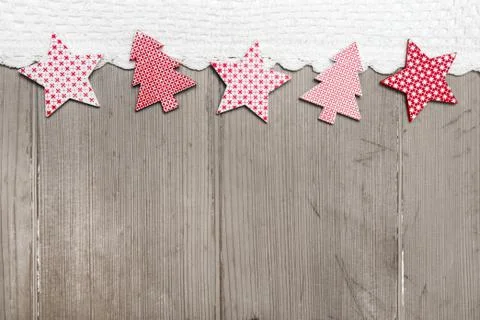 Top view of star and pine tree decoration with crochet strip on wooden backgr Stock Photos