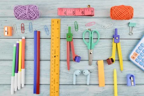 Top view of stationery tools over wooden background Stock Photos