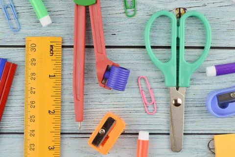 Top view of stationery tools over wooden background Stock Photos