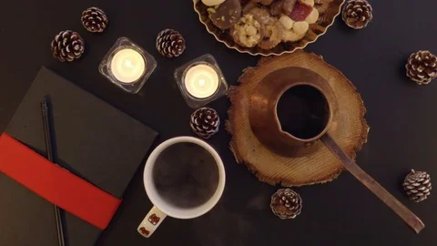 Top view steam from the hot coffee on the table with Christmas decoration Stock Footage 70012959