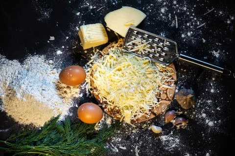 Top view of a still life of the process of making cheese balls with garlic an Fotos de archivo
