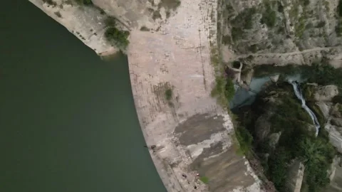 Top view of stone dam and lake Stock Footage 239942475