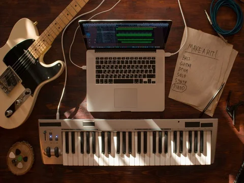 Top view stop motion of musician desktop recording track proccess at wooden desk Stock Footage
