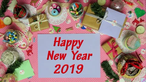 Top view stop motion on the theme of holiday with text Happy New Year 2019  emer Stock Footage 94031132