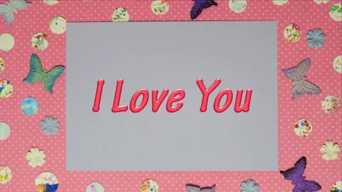 Top view stop motion on the theme of holiday with announce I Love You emerging f Stock Footage 94062002