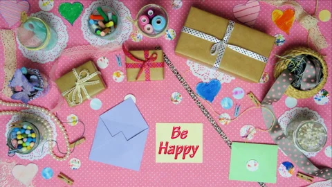Top view stop motion on the theme of holiday with text Be Happy on the card   em Stock Footage 94124642