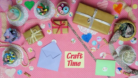 Top view stop motion on the theme of holiday with text Craft Time emerging from Stock Footage 94124938