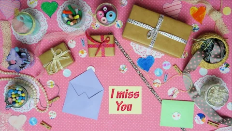 Top view stop motion on the theme of holiday with text I Miss You  on the card e Stock Footage 94125084