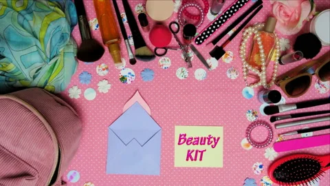 Top view stop motion on the theme of women's makeup accessories with text announ Stock Footage 94396235