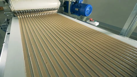 Top view of straight candy lines coming out from producing machine Stock Footage 85923046
