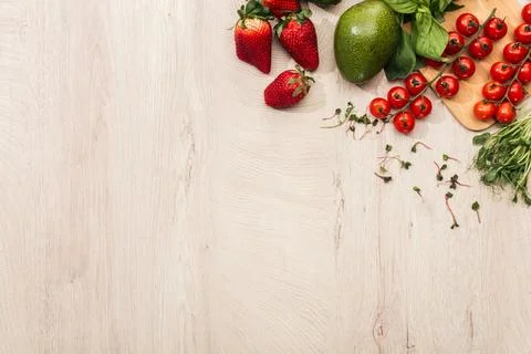 Top view strawberries cherry tomatoes Stock Photos