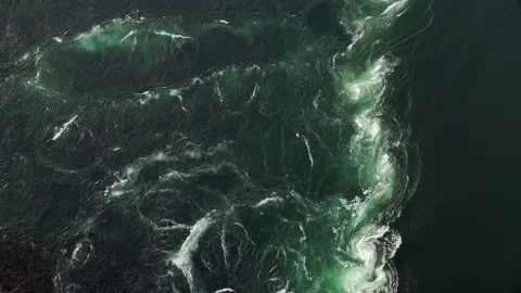 Top view of strong tidal current Salstraumen in Norway with vortex Video stock 238474292