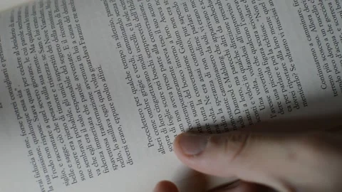 Top view student man's hand turning book's page 動画素材 204854608